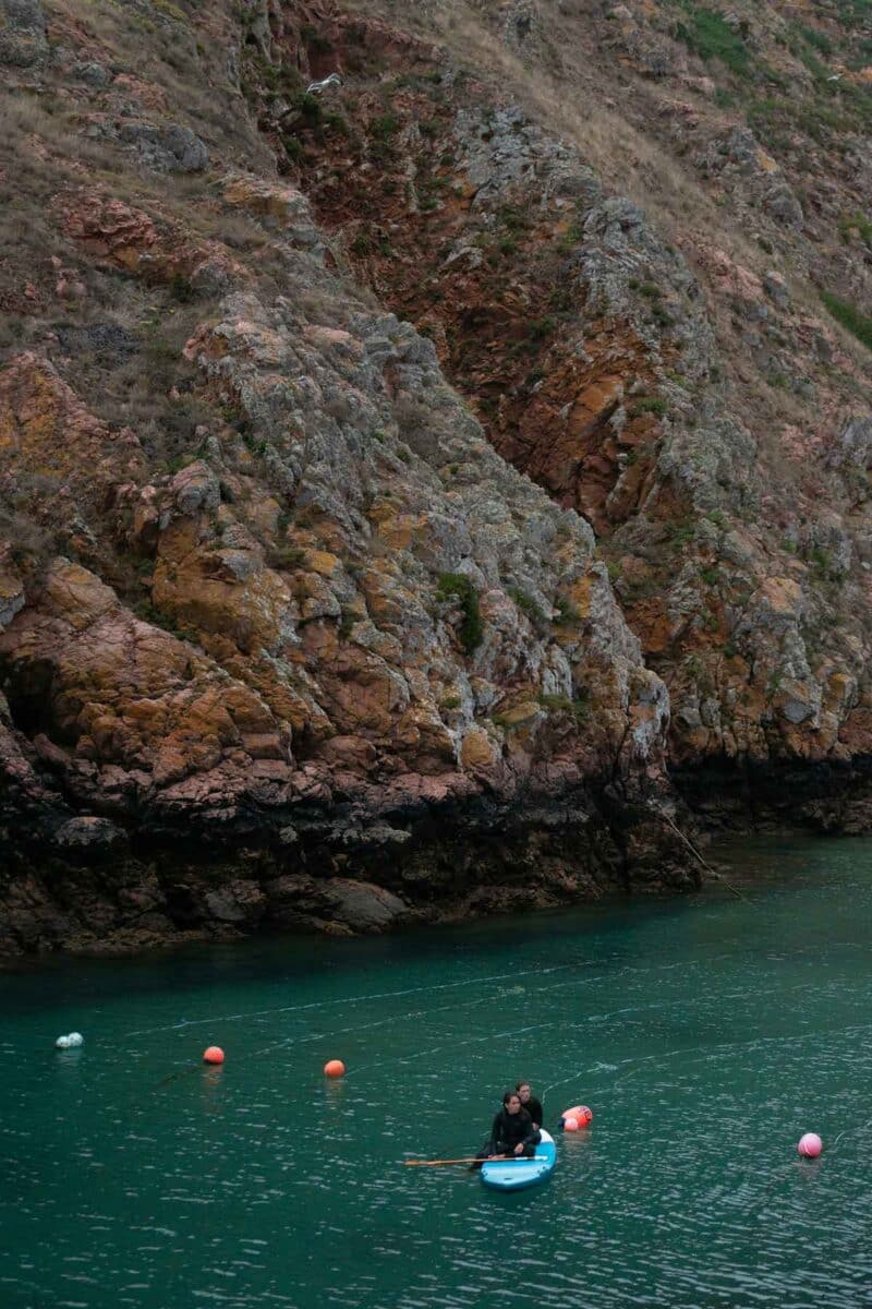 Two people doing stand-up paddling in Berlengas, Portugal.