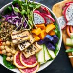 plant-based eater enjoying a grilled tofu and dragon fruit buddha bowl at one of Vancouver's best vegan restaurants