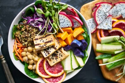 plant-based eater enjoying a grilled tofu and dragon fruit buddha bowl at one of Vancouver's best vegan restaurants