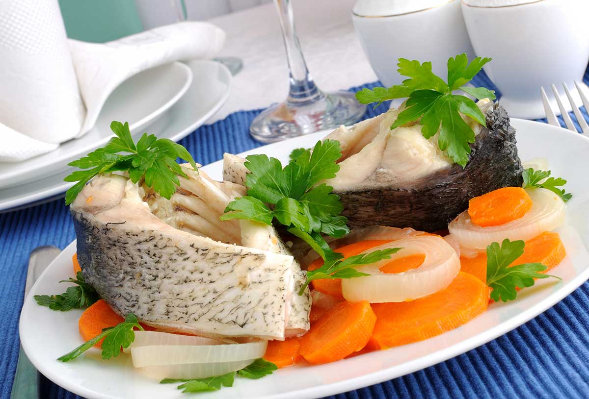 Boiled fish with vegetables.