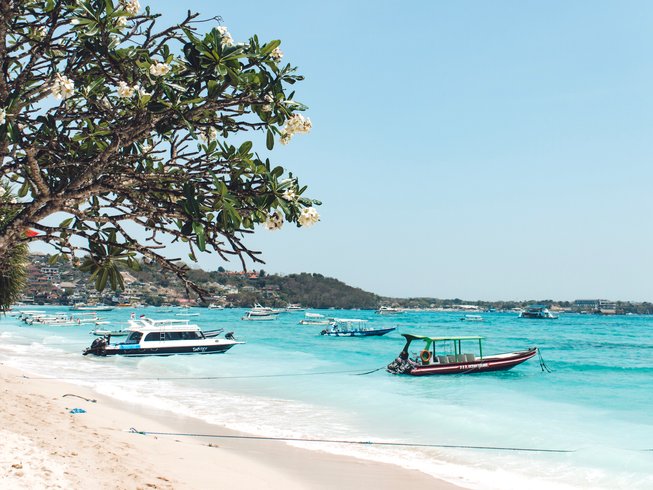 boats anchored along the beach at Nusa Lembongan