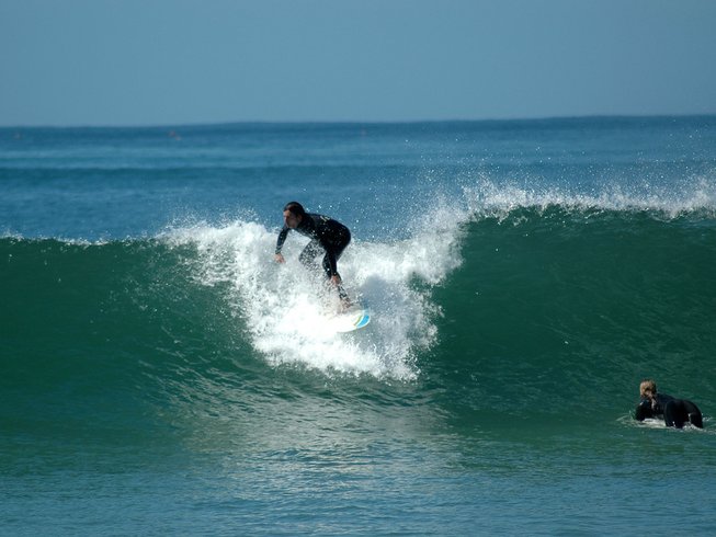 surfer catching a wave