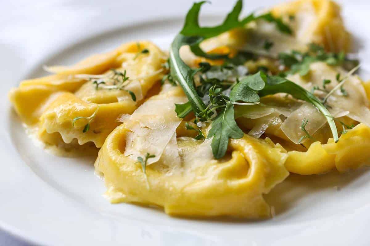 A close up photo of tortelloni.
