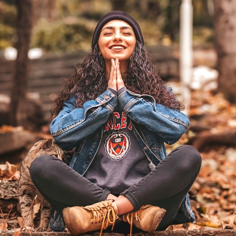 Woman meditating outside