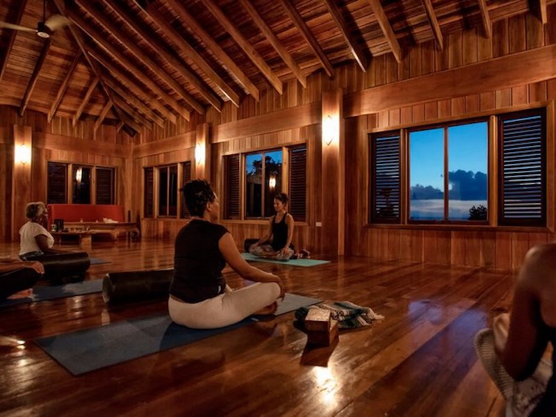 people doing a meditation class during a wellness retreat in Dominica
