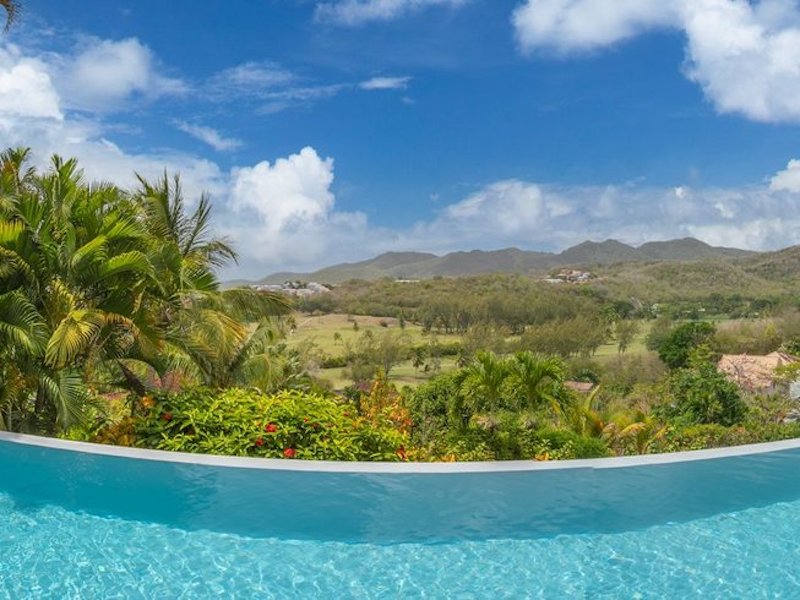 view of Martinique from the pool while on a Caribbean wellness retreat